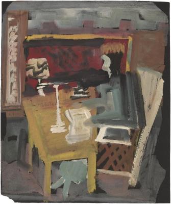 [Seated figure at desk]