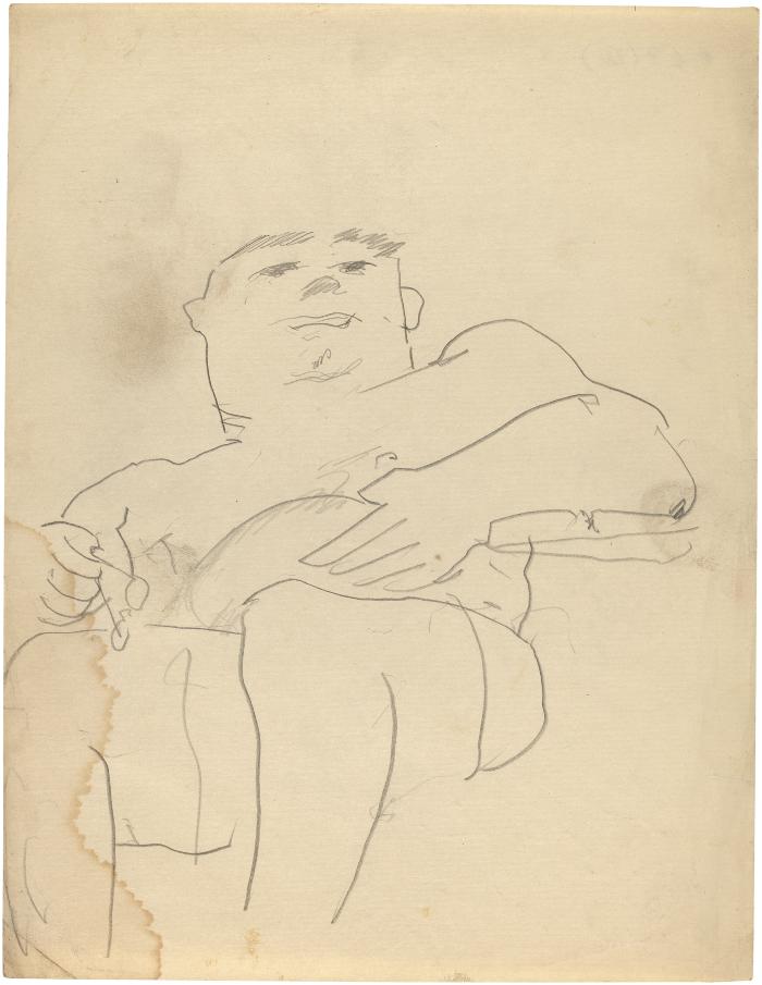 [Seated man holding eyeglasses]