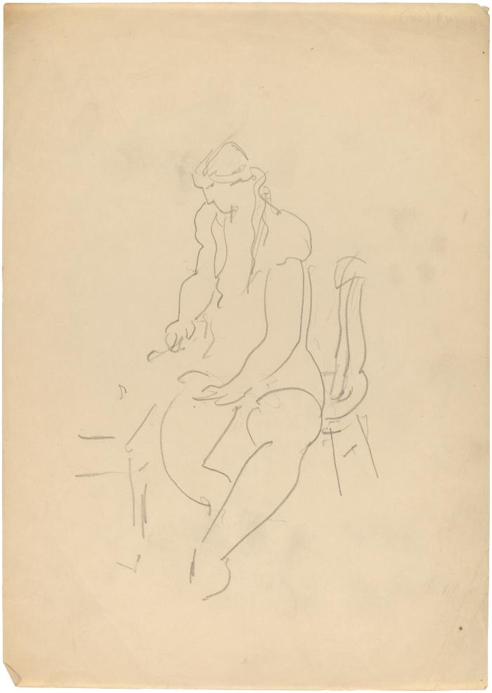 [Woman seated at table]