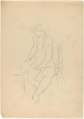 [Woman seated at table]