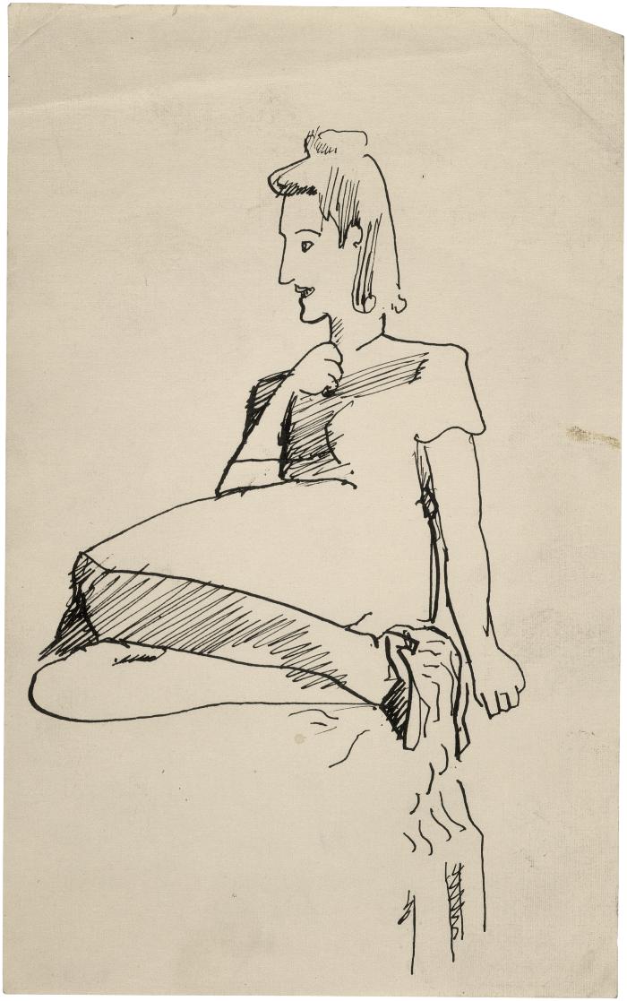 [Seated woman]