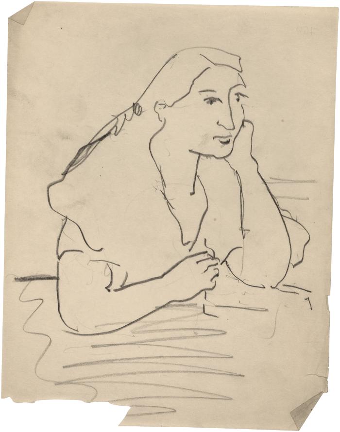 [Woman seated at table]