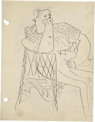 [Man in wicker chair]